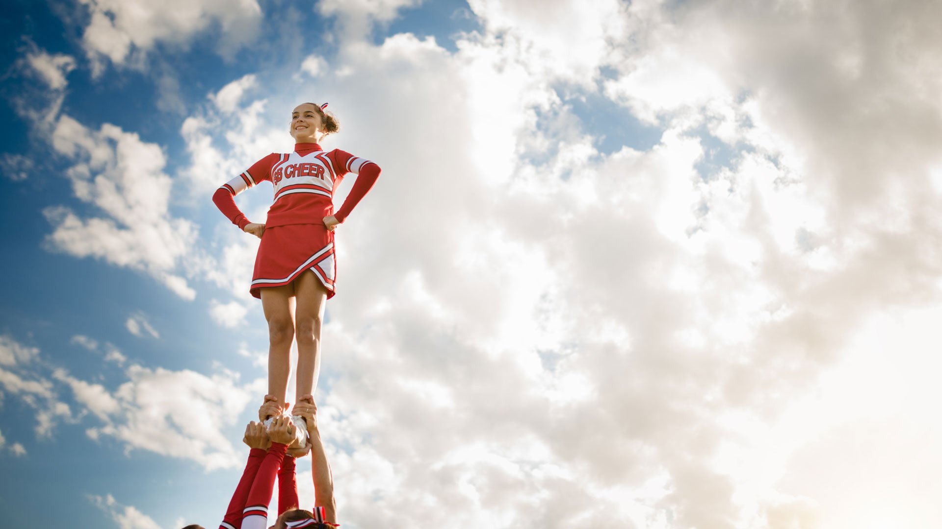 cheerleader being held in air