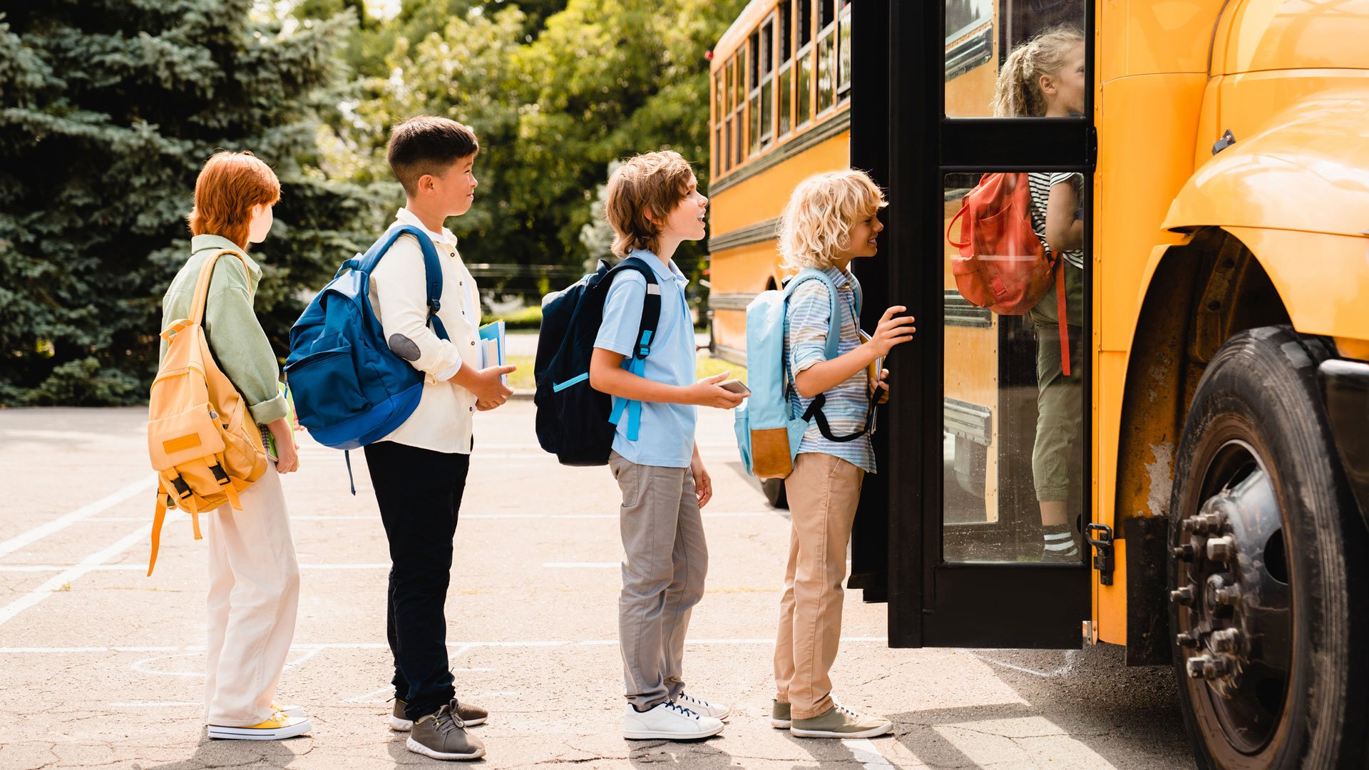 students boarding school bus