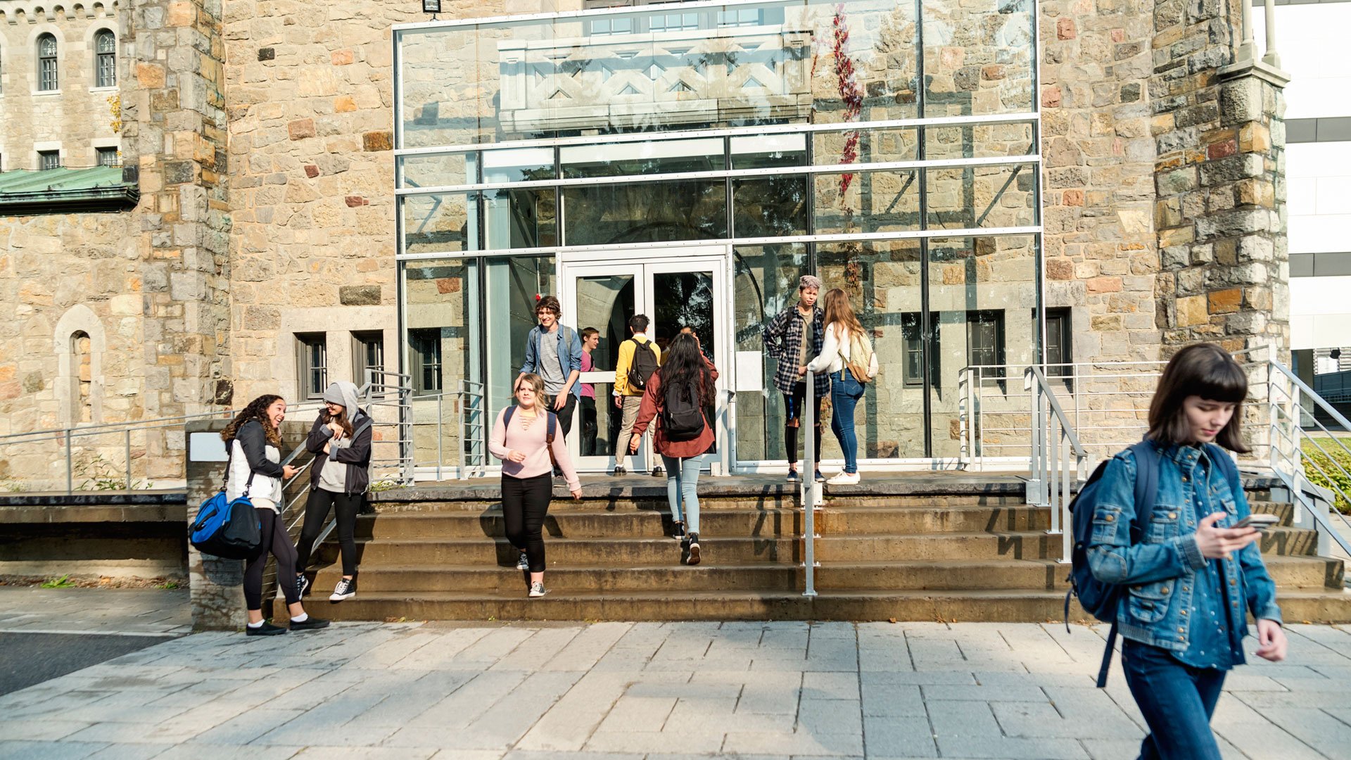 students walking on college campus