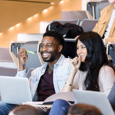 engaged college students in classroom